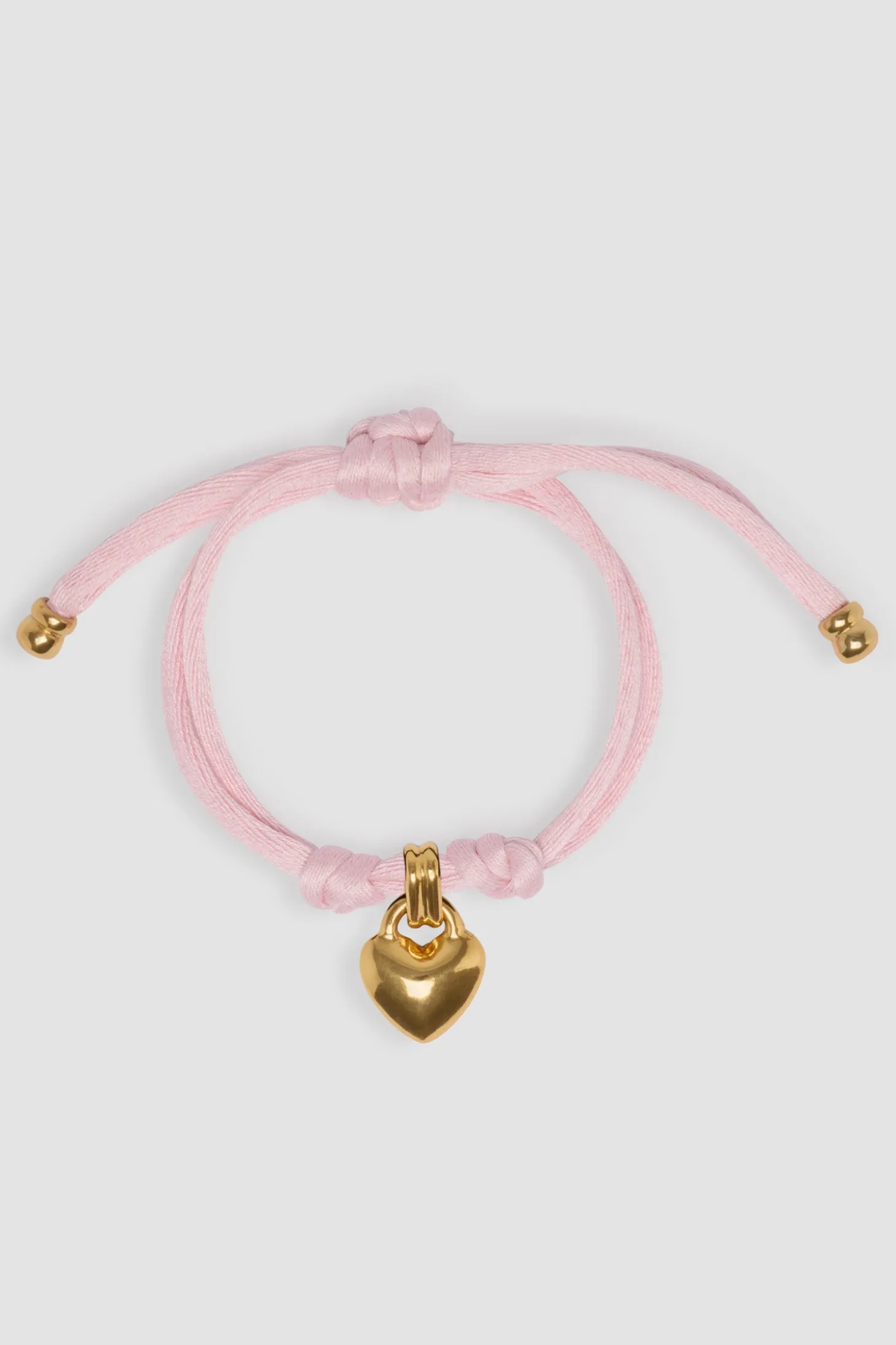 Bracelet cœur en laiton doré et coton