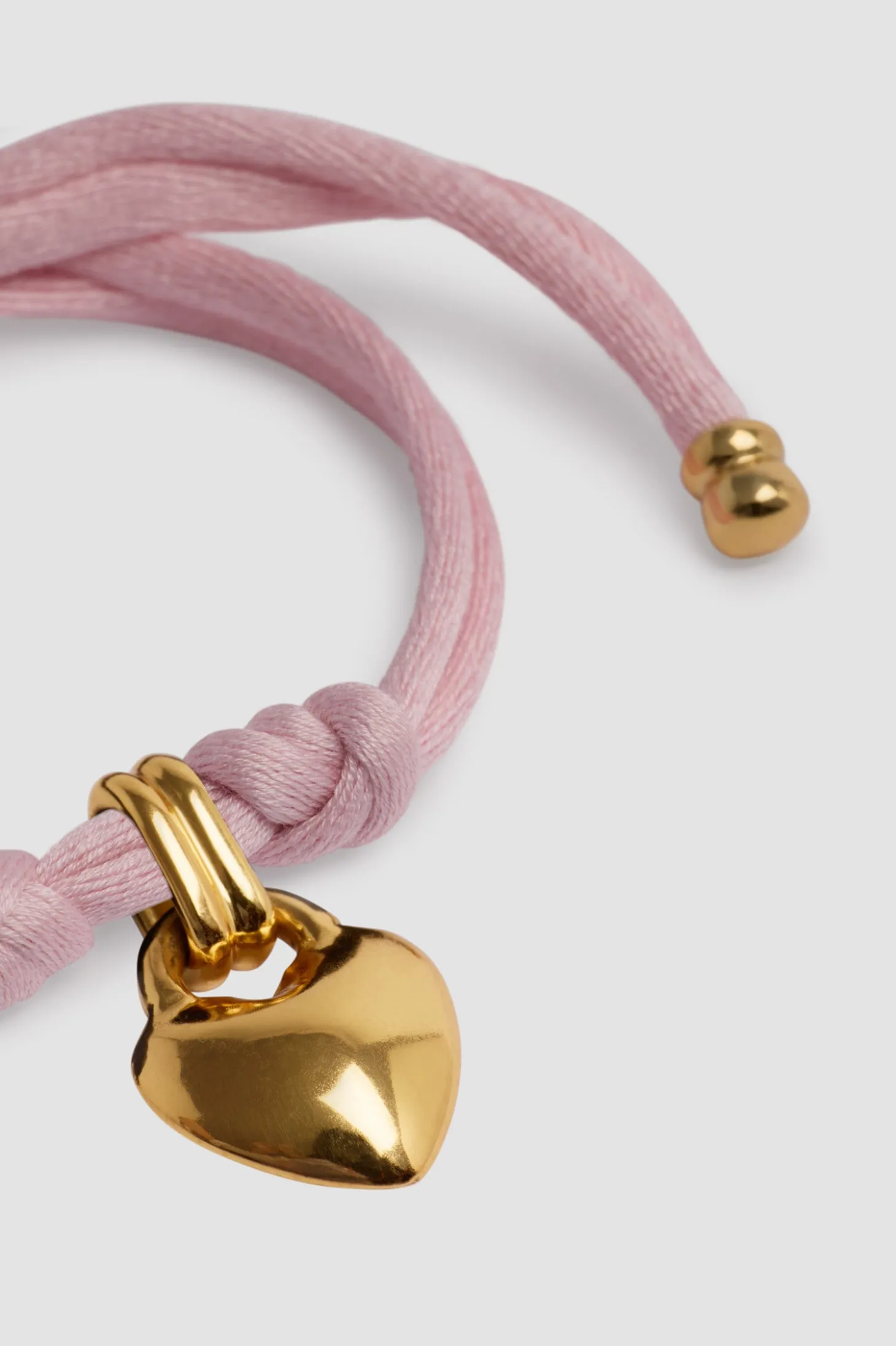 Bracelet cœur en laiton doré et coton