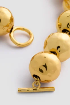 Collier à boules martelées en laiton doré