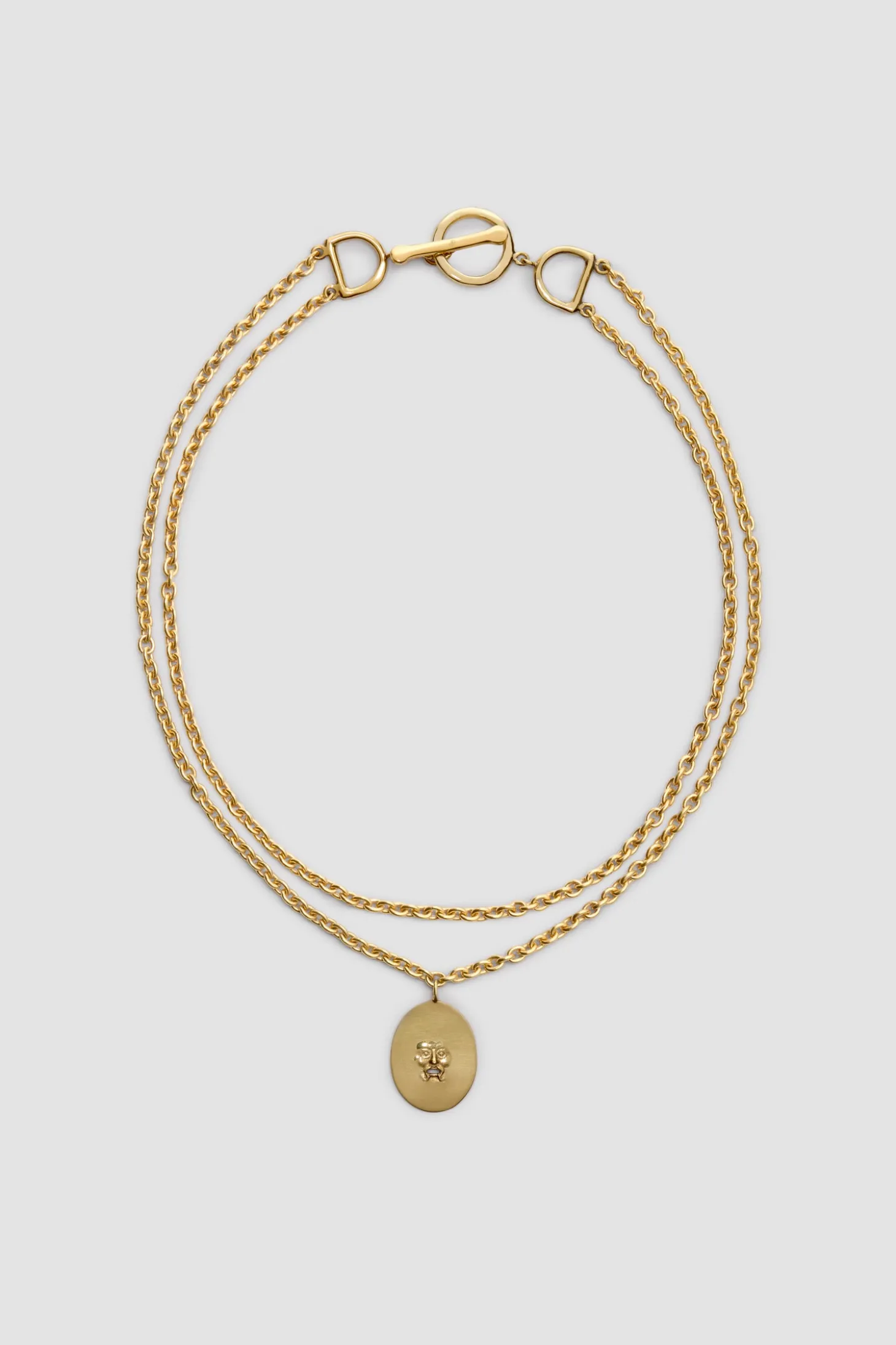 Collier à pendentif Bocca en laiton