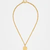 Collier à pendentif pièce en laiton doré