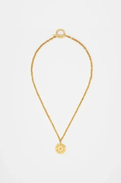 Collier à pendentif pièce en laiton doré